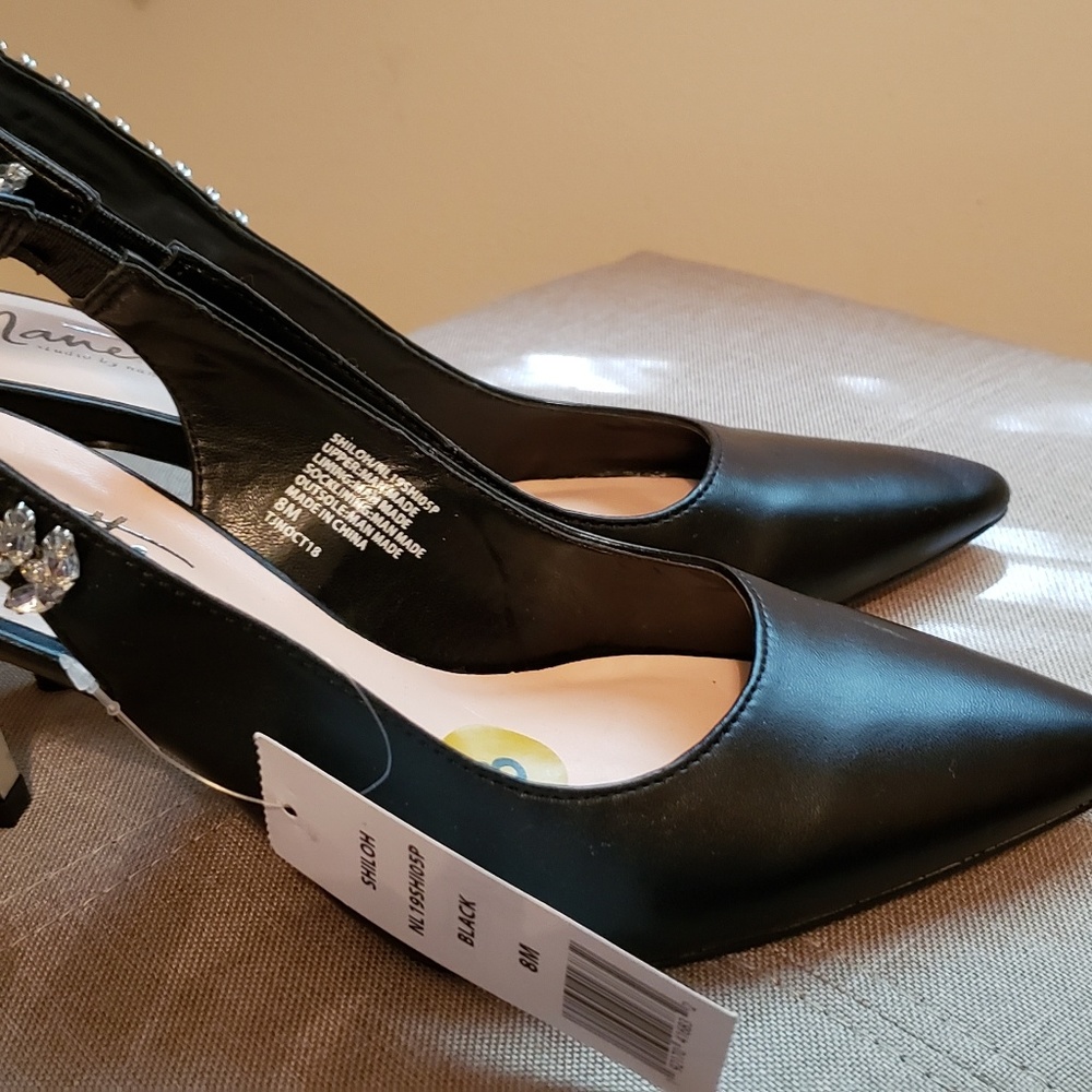 Black slingback pumps